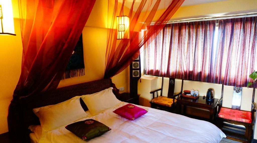Lijiang Wangjia Courtyard Inn Room photo